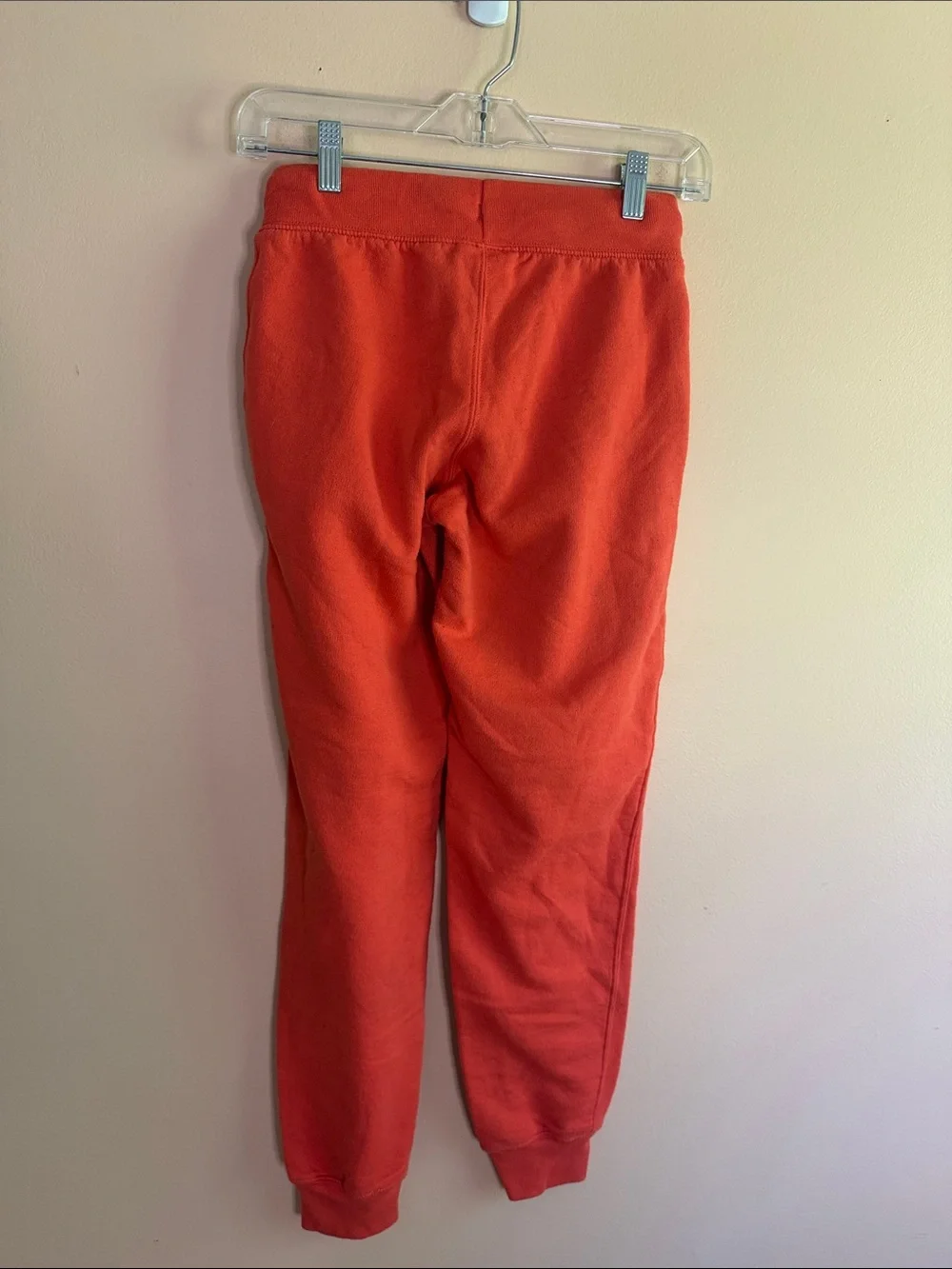 Champion Woman’s Bright Orange Logo Joggers with Script Side Graphic